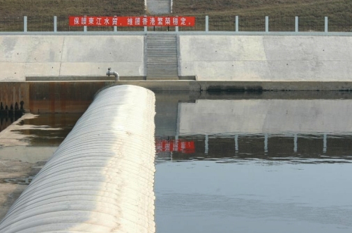Photo 17 - Shima River Sewage Diversion Works - Rubber Dam spanning across Shima River.
