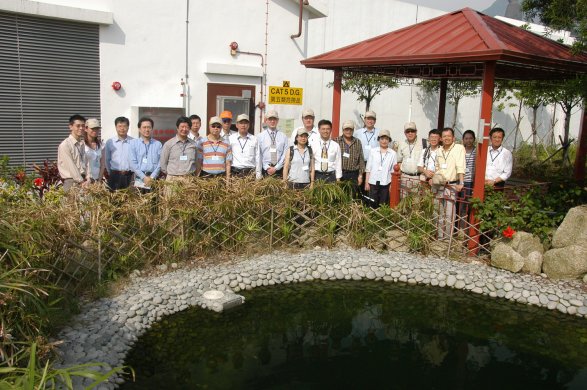 Photo 4 - Group Photo taken at the Fish Pond (water in the pond is treated sewage produced by the treatment works).