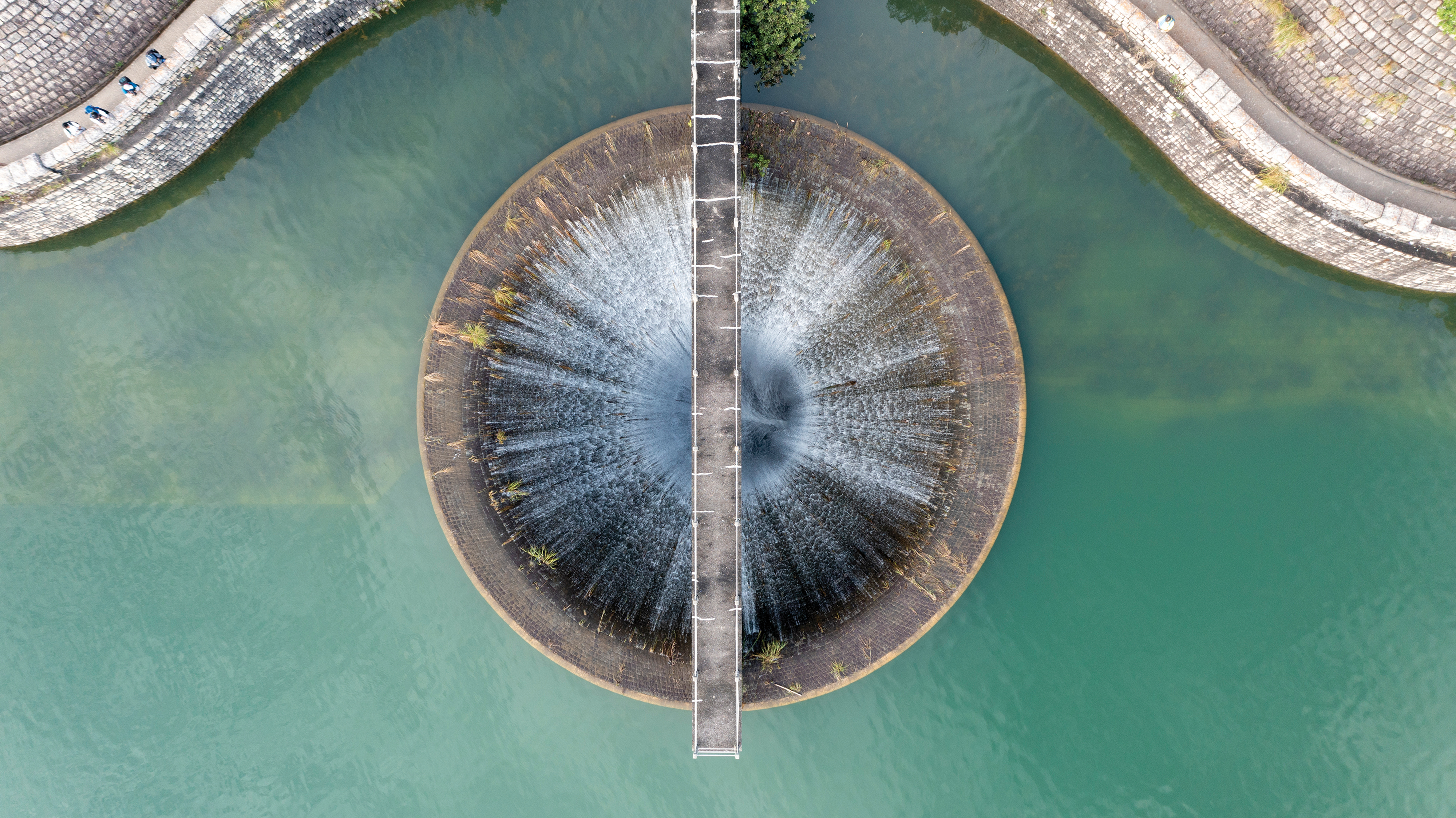Aerial view of the bellmouth spillway at the Shing Mun Reservoir
