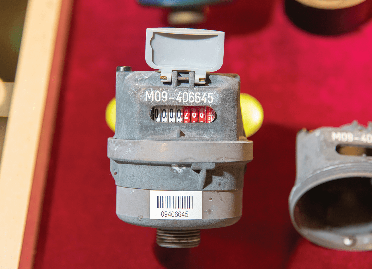 Metric rotary piston water meter