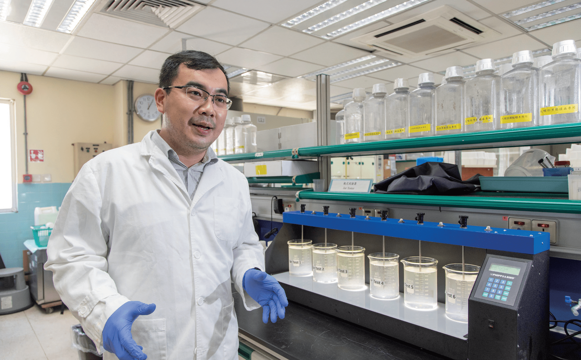 Waterworks Chemist CHAN Yuk-chi says that during heavy rainfall, they sometimes require conducting three jars tests in one night