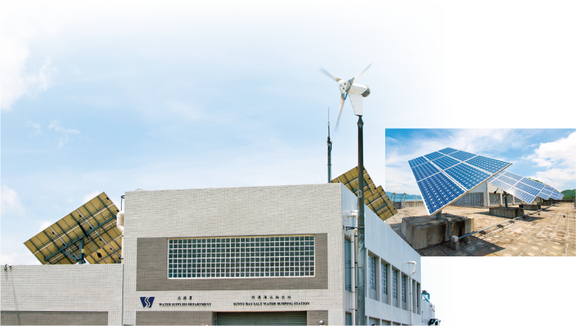 Solar panels and a wind turbine at Sunny Bay Salt Water Pumping Station Photo