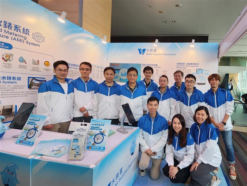 WSD staff pictured in front of the exhibition booth.