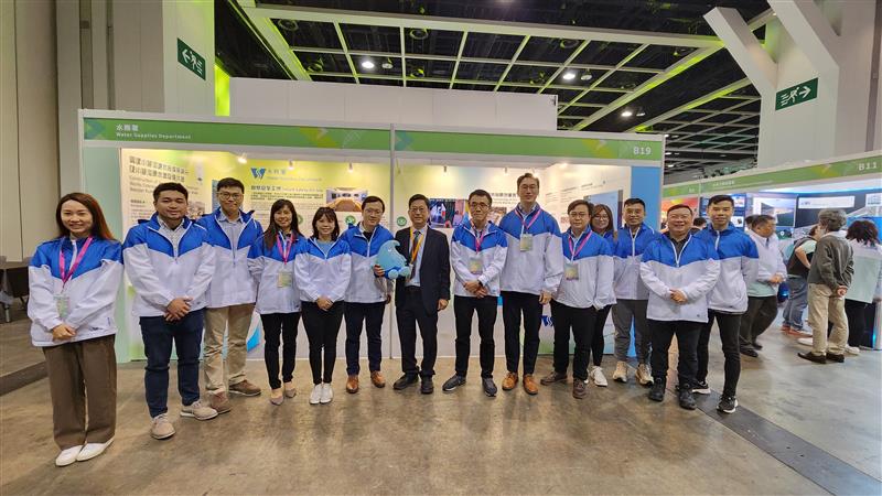 WSD’s Assistant Director, Mr. CHO Ping Ho (seventh right), pictured with the team members at the booth.