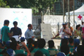 Participants listening to the result announcement